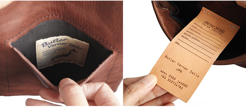サブポケットの中にはブランドタグ、メインポケットの中には本革製のオシャレなネームタグが付けられています。どちらも隠れたアクセントになっています。